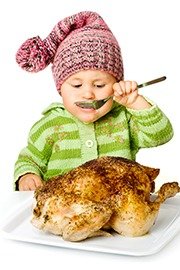 Funny child eating